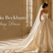 Luxury champagne bridal ball gown inspired by Victoria Beckham wedding dress style in a grand castle hall