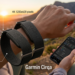 Garmin CIRQA smart band screenless fitness tracker in black fabric band.