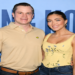 Jett Puckett and his wife Campbell posing together at an outdoor event.